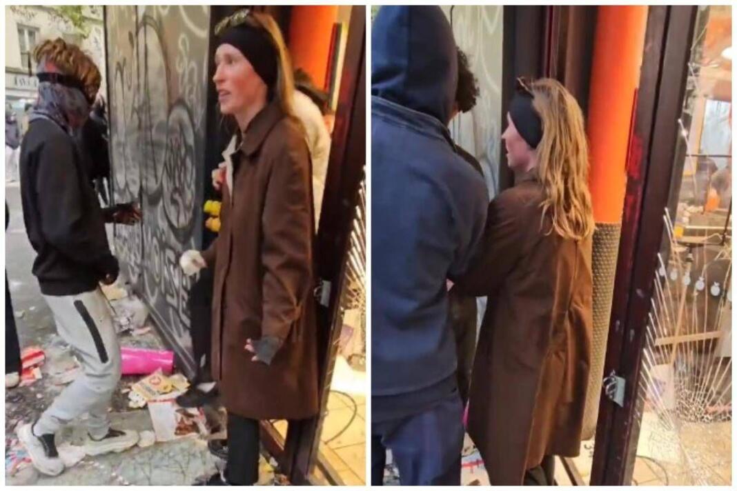 Parigi, donna prova a fermare i saccheggiatori: “Perché lo fate?”